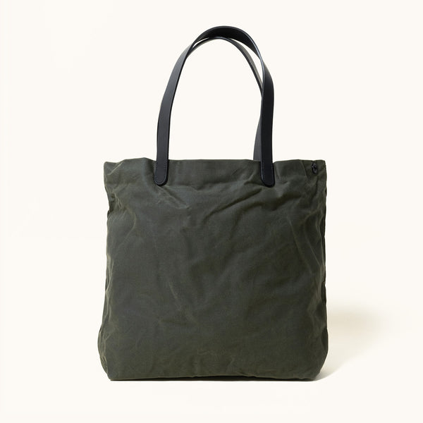 Waxed canvas leather tote bag in olive green with zipper closure and cross  body strap